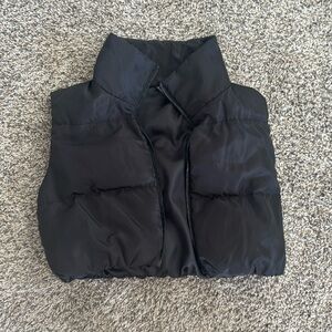 Black puffer vest